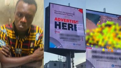 nigeria man play video billboard